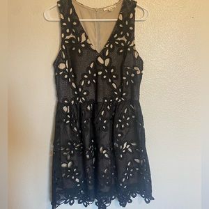Black eyelet lace dress with tan under, fit and flare medium